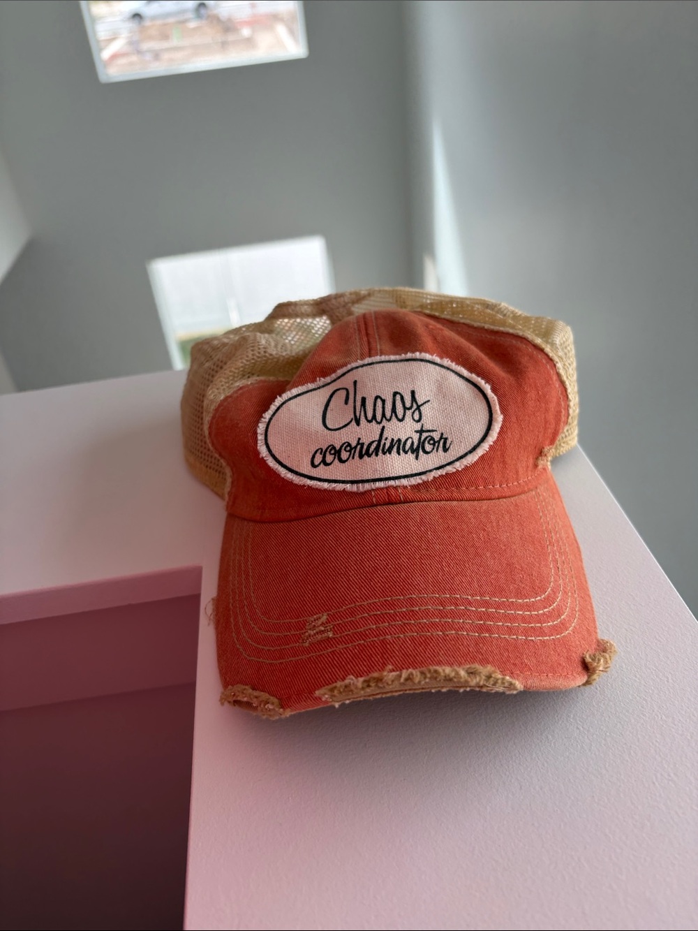 Chaos Coordinator Orange Mesh Trucker Hat